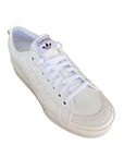 Sneakers Adidas Nizza Platform bianche da donna con suola rialzata, tomaia in canvas, dettagli in pelle e logo Adidas laterale - alto
