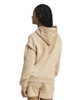 Felpa Adidas Essentials JV7310 sabbia donna con cappuccio, vista posteriore