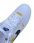 Vista dall'alto delle Nike Gamma Force HJ5997-101 bianco-giallo, silhouette moderna con accenti colorati