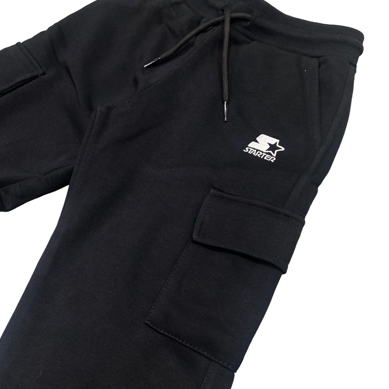 Starter pantalone sportivo con tasconi da ragazzo. Colore nero