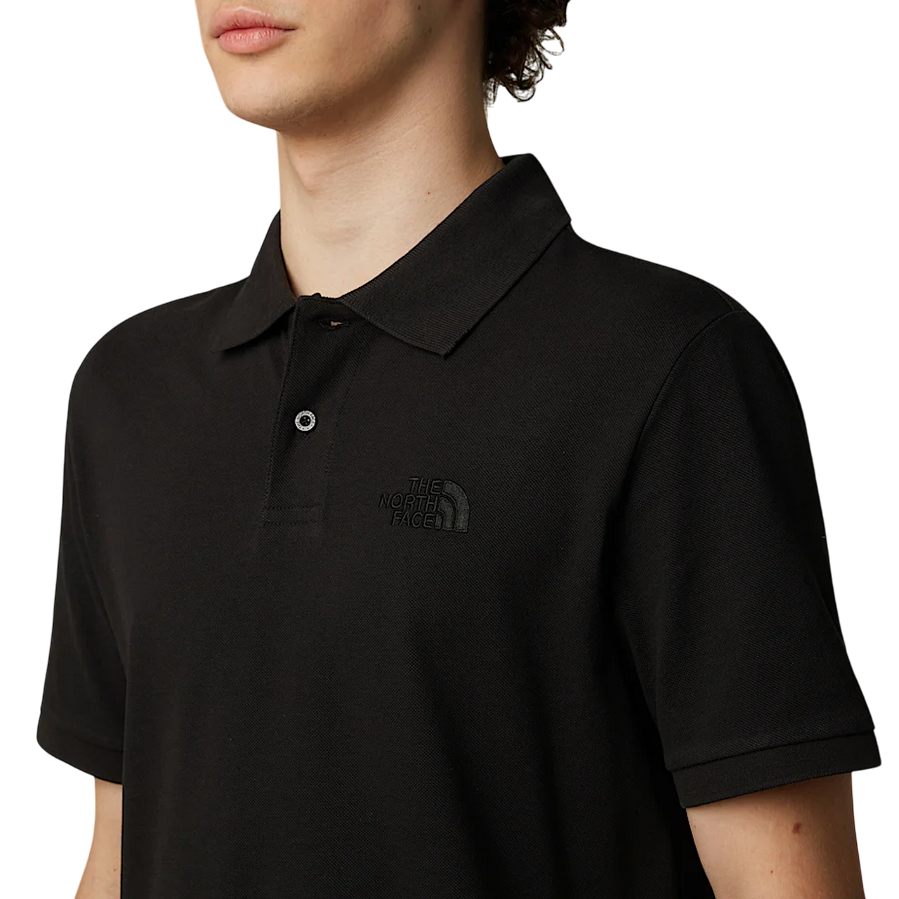 The North Face polo manica corta da uomo in cotone piquet Essential NF0A8C1PJK3 nero