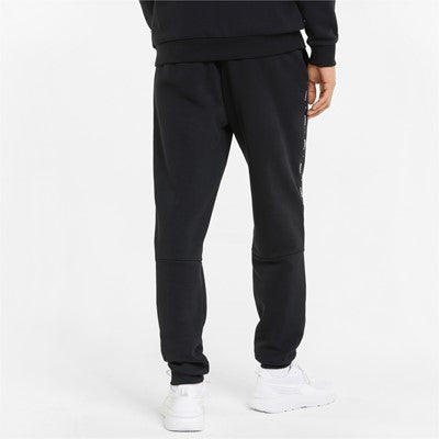 Puma fleece trousers with side band and cuff at the bottom ESS+ Tape Sweatpants FL cl 849042 01 black