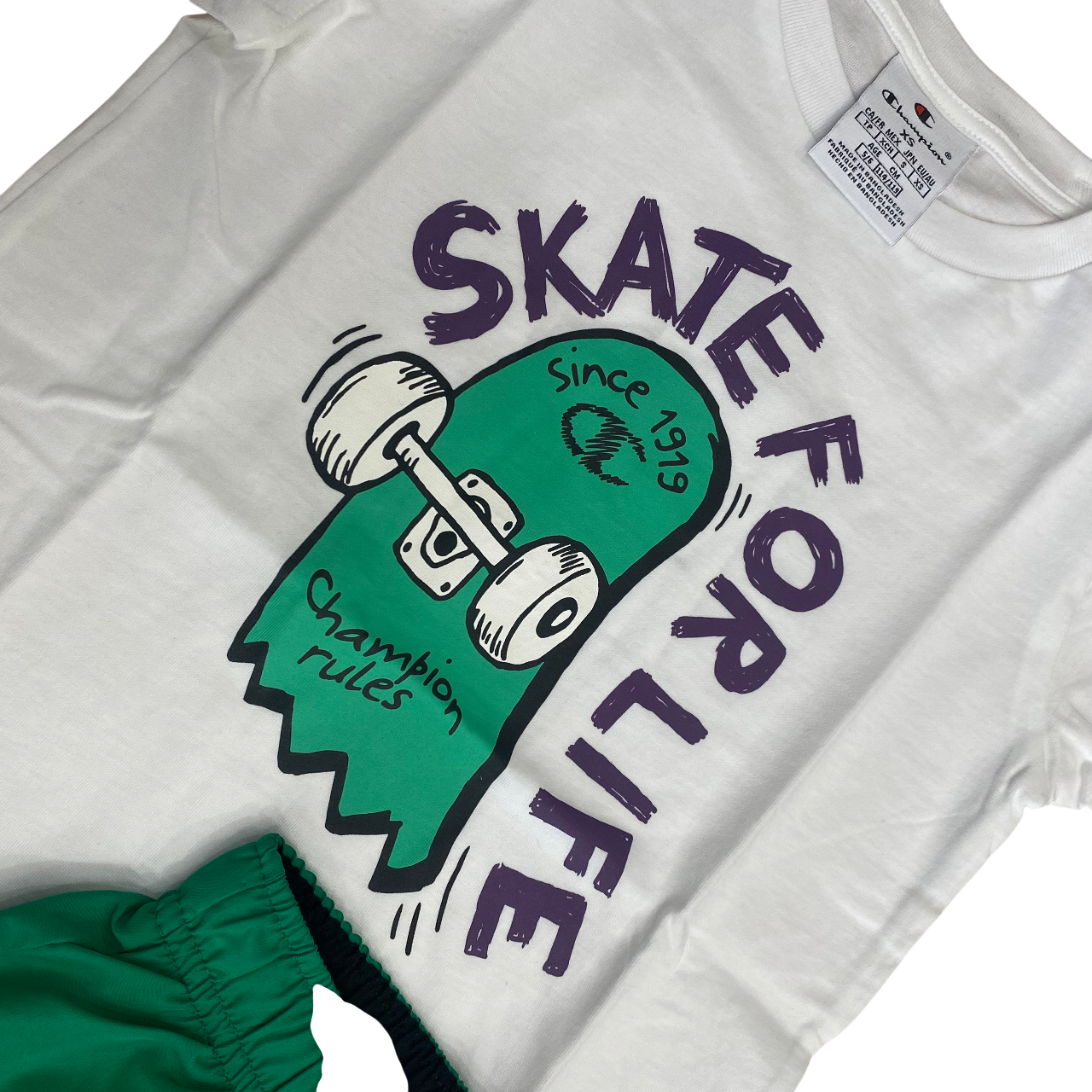 Set skate Champion per ragazzi modello 307063 WW001 bianco e verde, completino junior originale - dettaglio