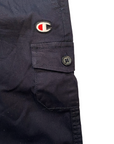 Champion Cargo sports trousers with elastic and big pockets for boys 306767 KK001 black