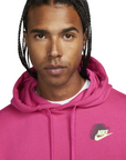 Nike Standard Issue men's hoodie FD0414-621 fuchsia