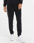 Puma fleece trousers with side band and cuff at the bottom ESS+ Tape Sweatpants FL cl 849042 01 black